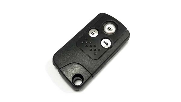 How do I replace the battery in my Toyota car key?
